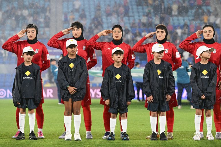Iranian Women's Football Team Faces Backlash Over Anthem Protest Amid Regional Tensions