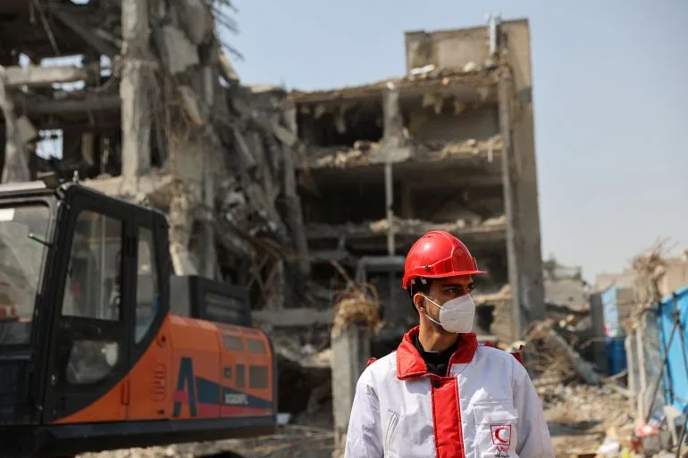 Iran's Red Crescent Teams Search for Survivors After US-Israeli Air Strikes in Qom and Tehran, as Casualties Mount