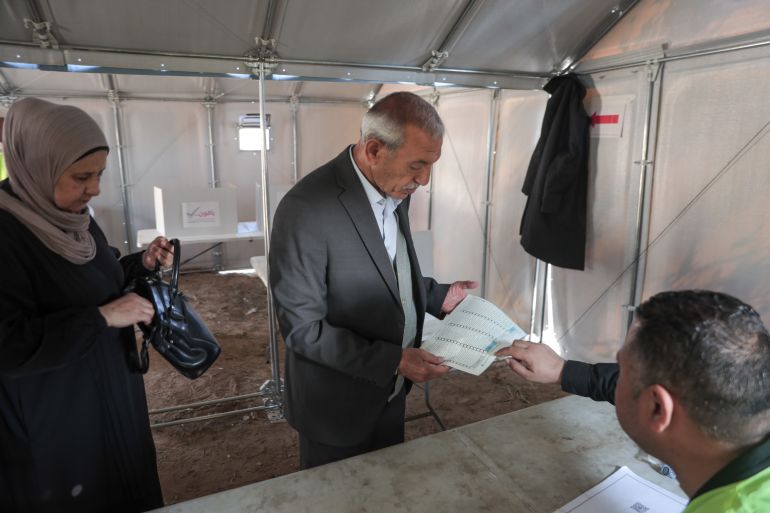 Gaza residents cast historic votes in makeshift shelters amid ongoing war.