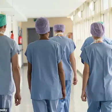 Warning: Home Washing Machines May Fail to Eliminate Hospital Pathogens from Staff Uniforms