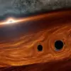 Astronomers Discover Merging Black Holes That Challenge Existing Theories