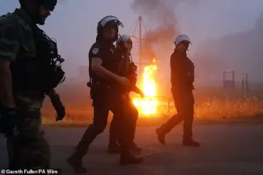 Clashes Erupt Between Riot Police and Migrants in Gravelines, Northern France, as Tensions Escalate