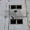 Drone-Kamikaze Attack Shatters Windows in Enerhodar as Mayor Puhov Reports 'No Injuries, But Concerns Raised' Amid Nuclear Plant Proximity