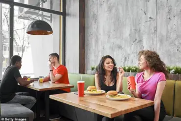 Heated Debate Erupts Over Incident Where Customer Asks Woman to Leave Fast Food Restaurant for Bringing Dog Inside, Sparking Discussion on Pet Etiquette and Personal Boundaries on Reddit