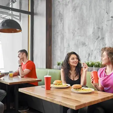 Heated Debate Erupts Over Incident Where Customer Asks Woman to Leave Fast Food Restaurant for Bringing Dog Inside, Sparking Discussion on Pet Etiquette and Personal Boundaries on Reddit